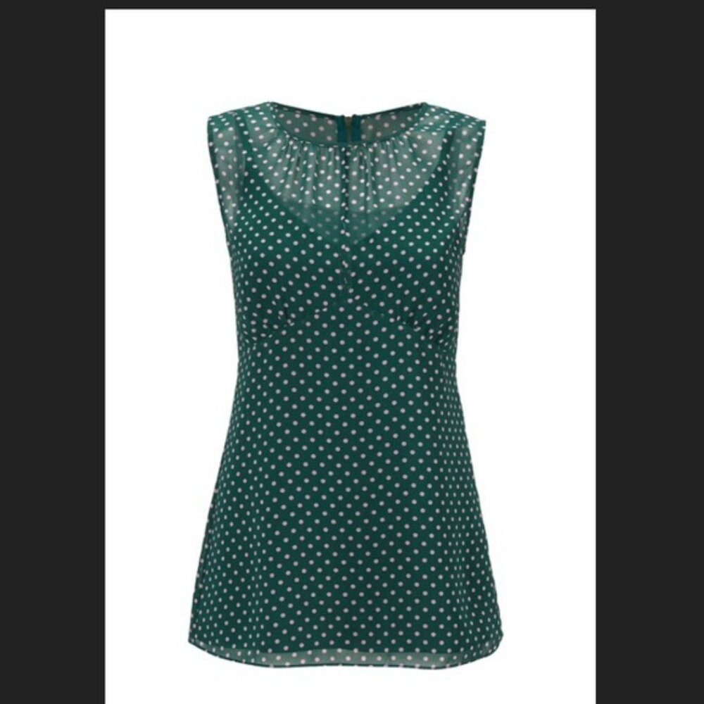 New without tags.  Cute green with pink polka dots cabi top.